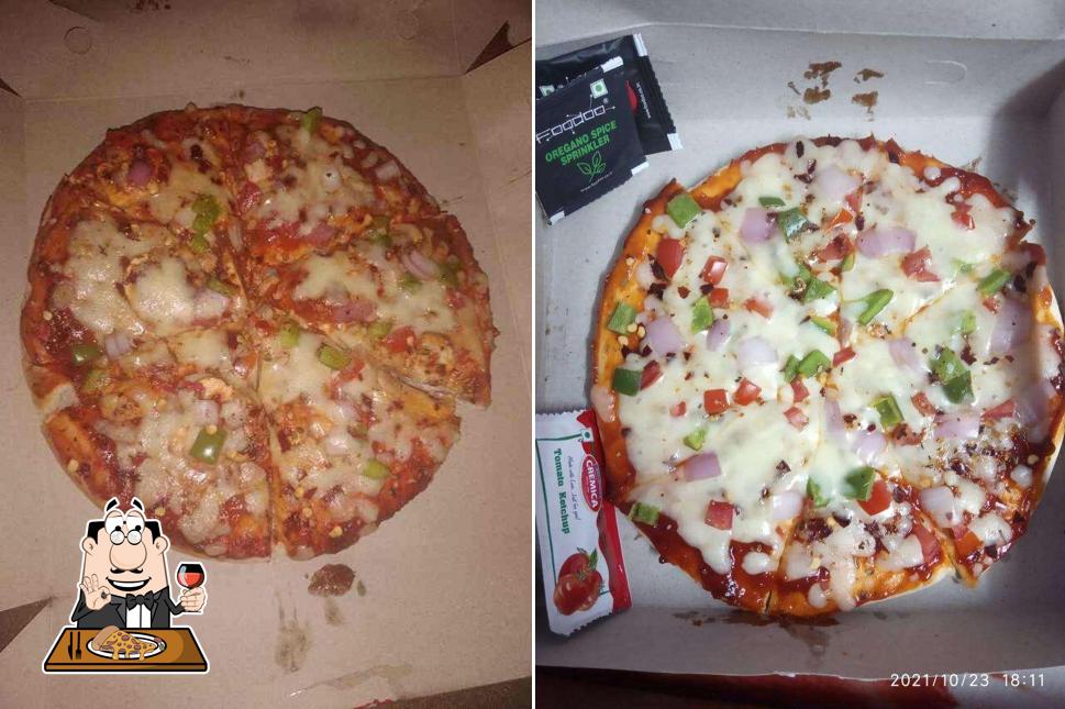 Pick pizza at Aravind's Kitchen