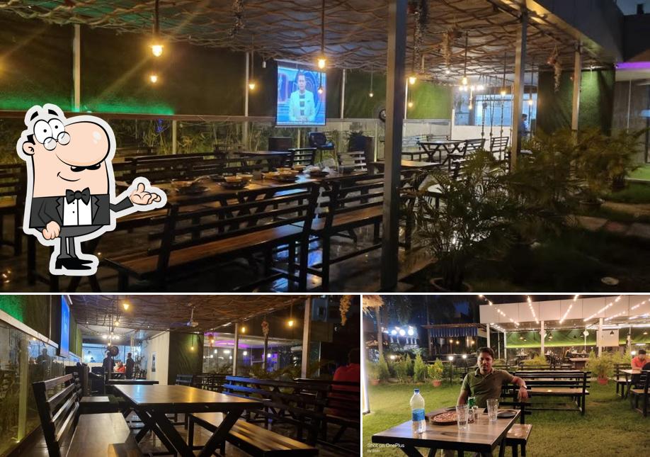 Take a seat at one of the tables at Pool Café, Jamshedpur