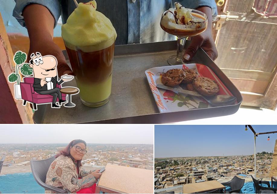 This is the photo depicting interior and food at Kuku Coffee Shop