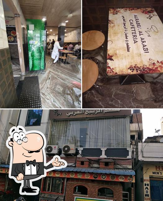 Take a seat at one of the tables at AL Rabea AL Arabi Cafeteria