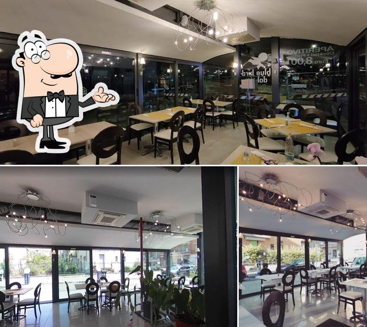 Dai un'occhiata agli interni di Pizzeria Blue Bird