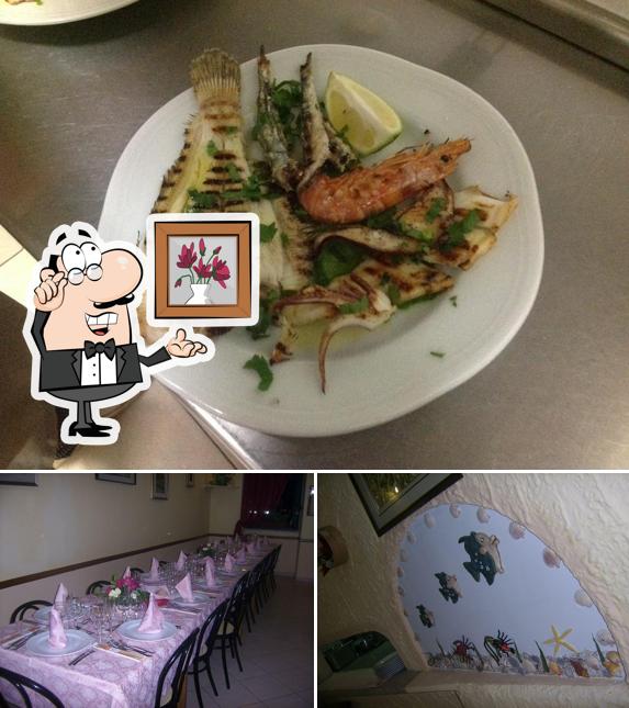 Dai un’occhiata alla foto che raffigura la interni e tavolo da pranzo di Calypso