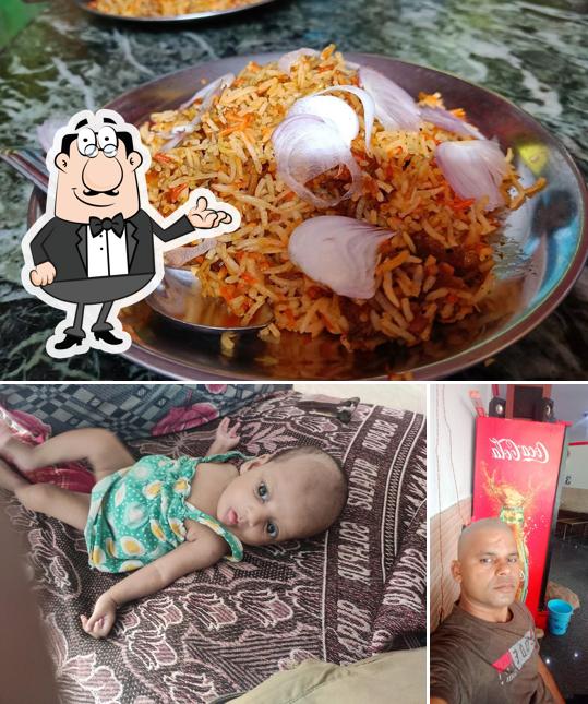 Check out the picture depicting interior and food at Royal Briyani