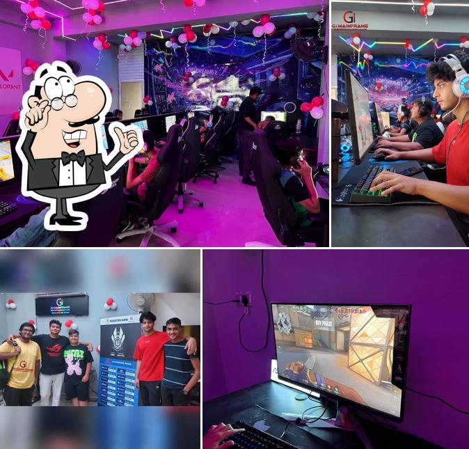 Take a seat at one of the tables at Gi Mainframe Esports Gaming Cafe