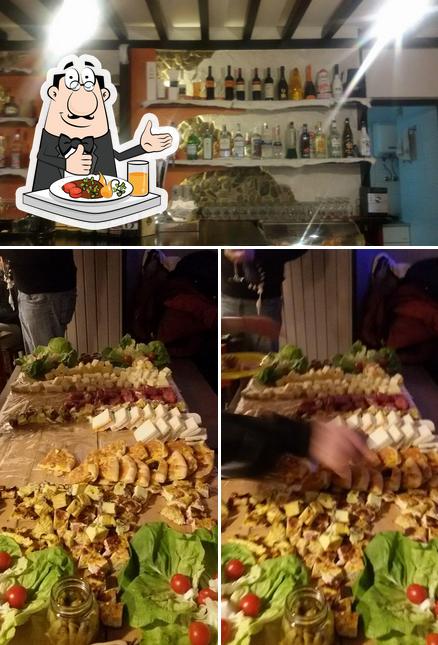 Questa è la immagine che mostra la cibo e bevanda di Al Stussighin