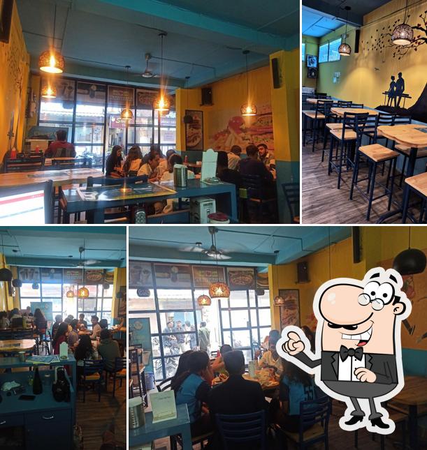 Take a seat at one of the tables at Cafe Cloud 9