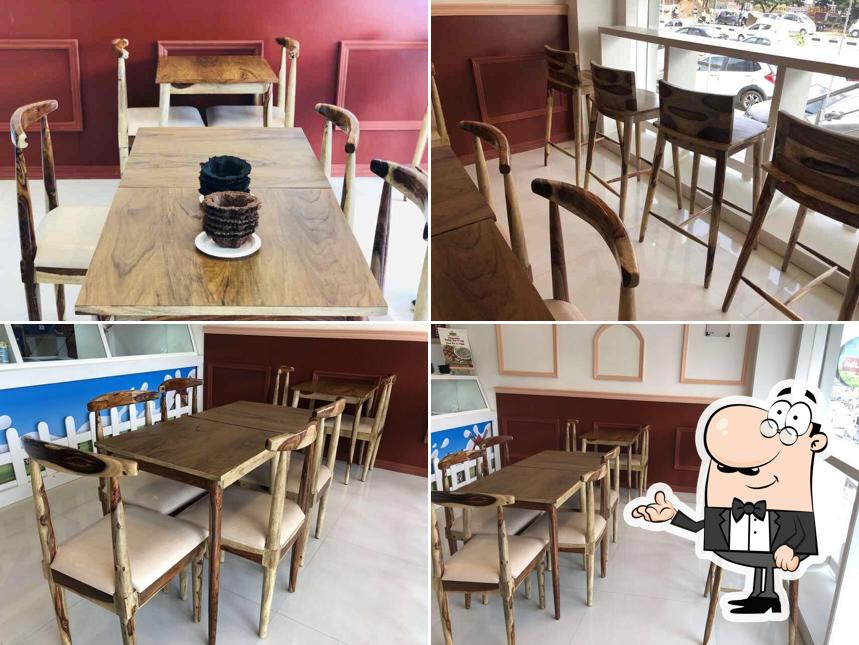 Take a seat at one of the tables at Molly Moo