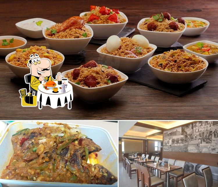 Take a look at the photo depicting food and dining table at Dindigul Thalappakatti Restaurant