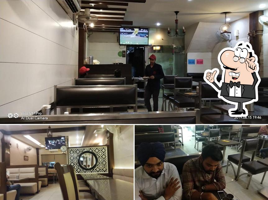 Take a seat at one of the tables at Parkash Dhaba