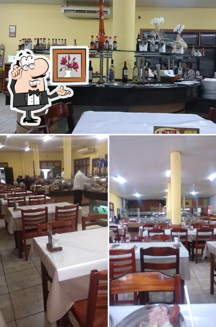 O interior do Churrascaria e Pizzaria Vila Nova