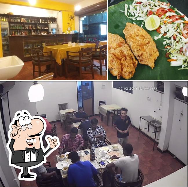 Take a seat at one of the tables at Rados Beer & Biryani