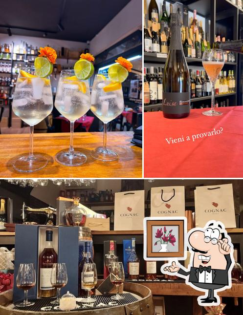 Dai un'occhiata agli interni di Enoteca Versatile Aperitivo e Apericena Infernetto Casalpalocco Axa