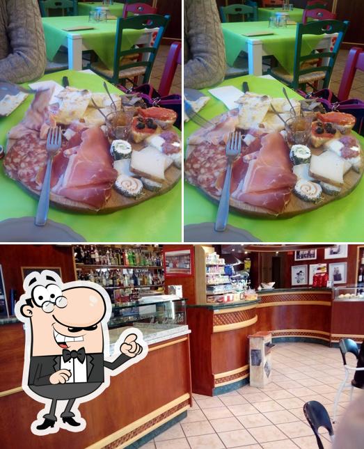 Dai un'occhiata agli interni di Bar pizzeria la Pineta