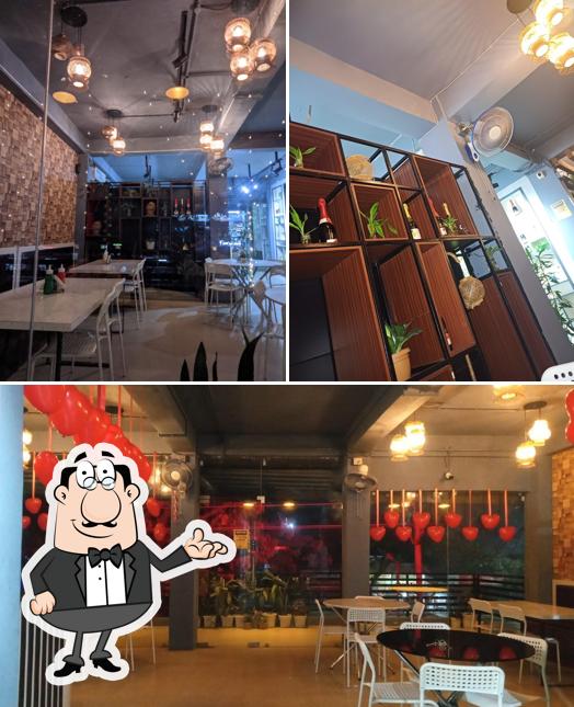 Take a seat at one of the tables at Daily Bazar with Delhi Chai Cafe
