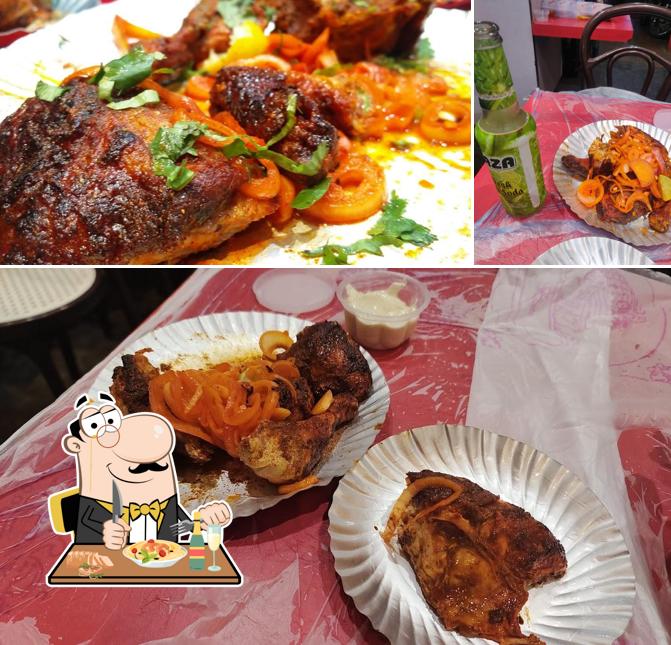 Take a look at the picture showing food and beer at Pop Tates Eatery