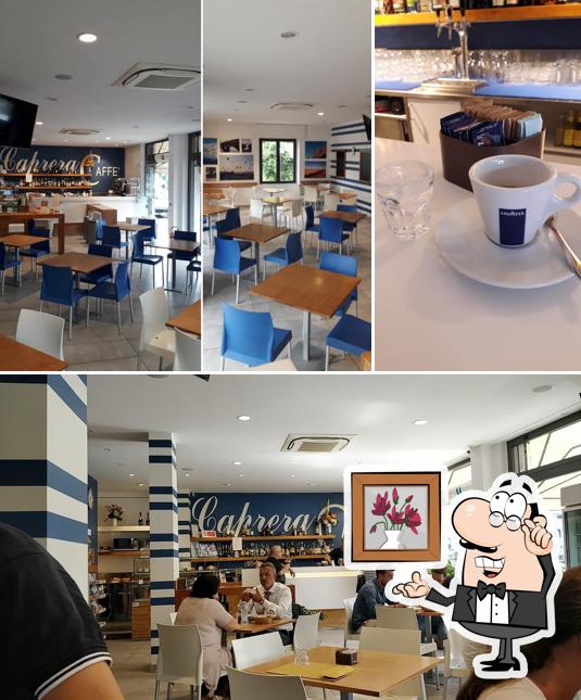 Dai un'occhiata agli interni di Caprera Caffé