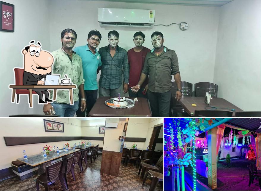 Take a seat at one of the tables at PUNKS VATIKA RESTAURANT & BAR