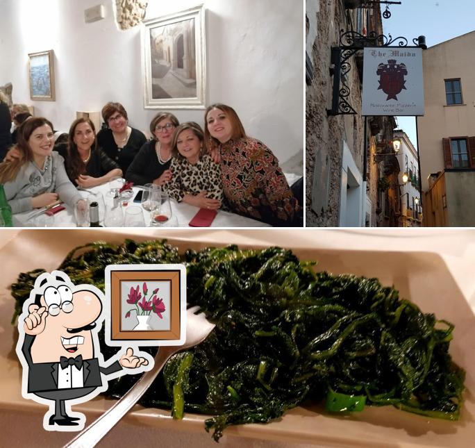 Questa è la immagine che mostra la interni e cibo di TheMaida