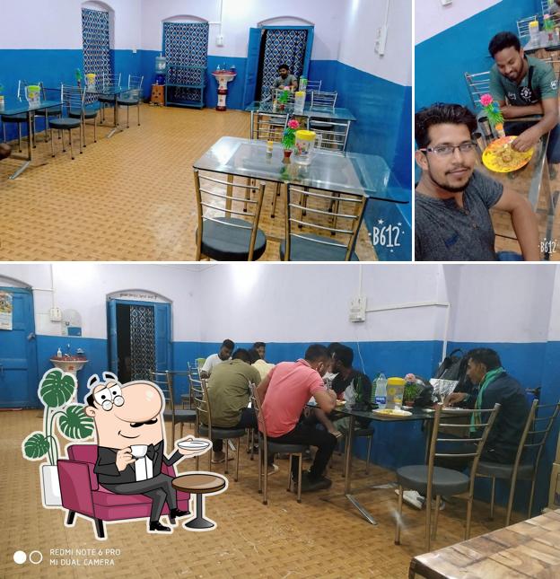 The photo of interior and food at Hotel Lazeez, Biryani