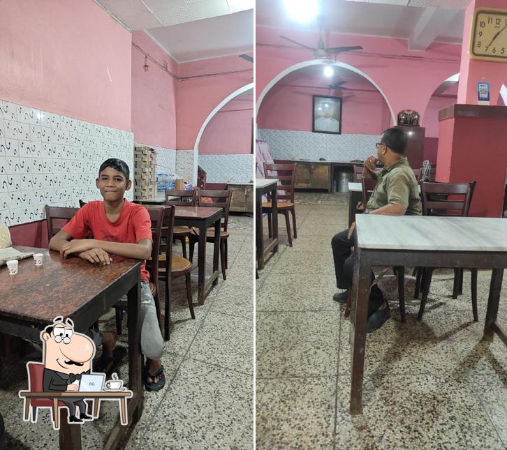 Take a seat at one of the tables at New Sila Restaurant