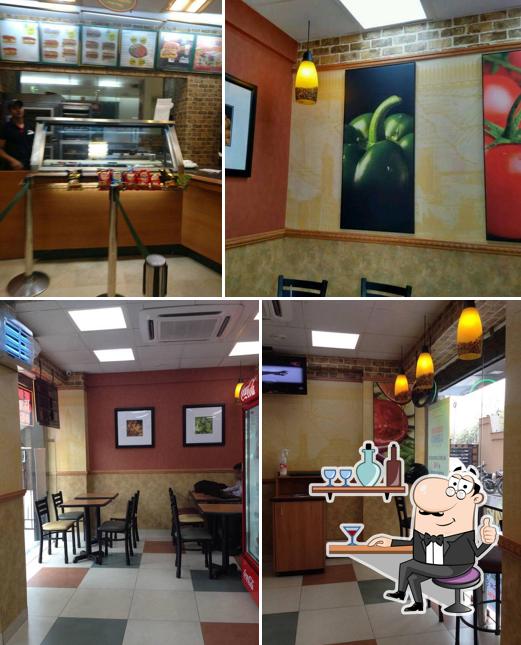 Take a seat at one of the tables at Subway Lake Mall