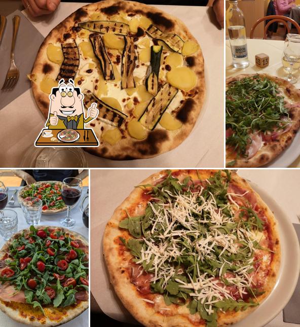 A Pizzeria Alla Ruota, puoi assaggiare una bella pizza