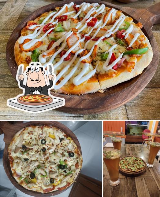 Get pizza at Uptown Vibes