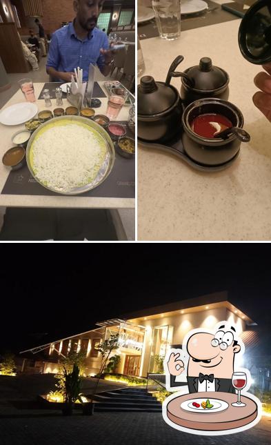 Take a look at the photo depicting food and interior at Delicia Restaurant