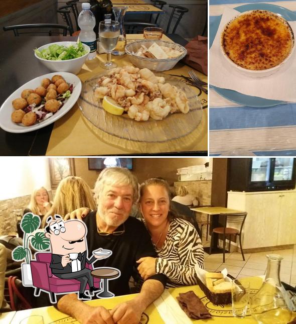Siediti a un tavolo di Ristorante Pizzeria Lo Scivolo