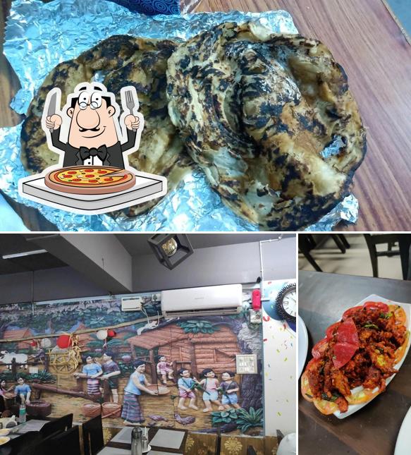 Get pizza at hunger house restaurant