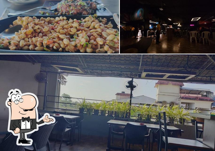 The photo of Ozone Roof Top’s interior and food