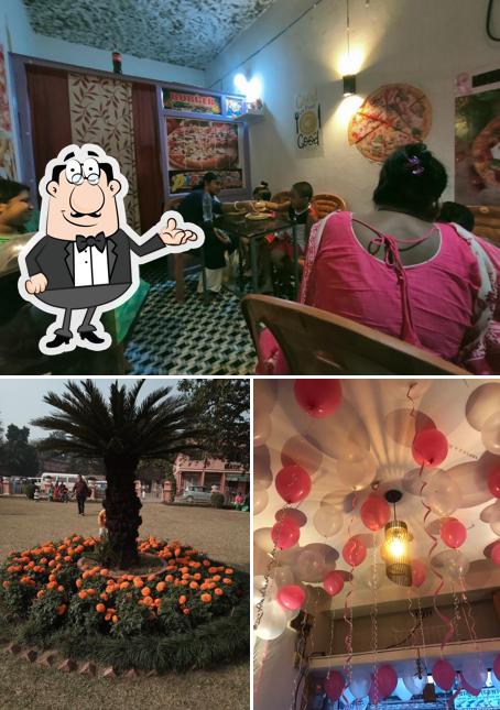 Check out the photo depicting interior and exterior at Pizza House