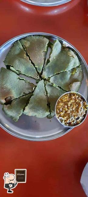 See the image of Hari Om Dhaba by Bunty Luthra Best Pure Veg Restaurant in Nashik Authentic Taste & Family-Friendly