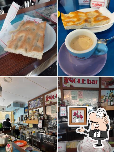 Guarda la foto che presenta la interni e cibo di Bar Angle
