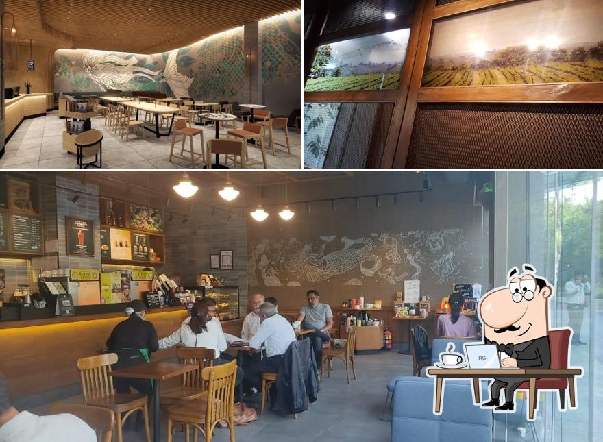 Take a seat at one of the tables at Starbucks