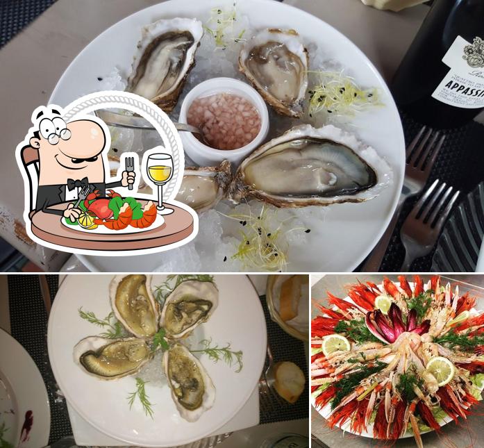 Scegli tra i vari pasti di mare offerti a Osteria del Capanno