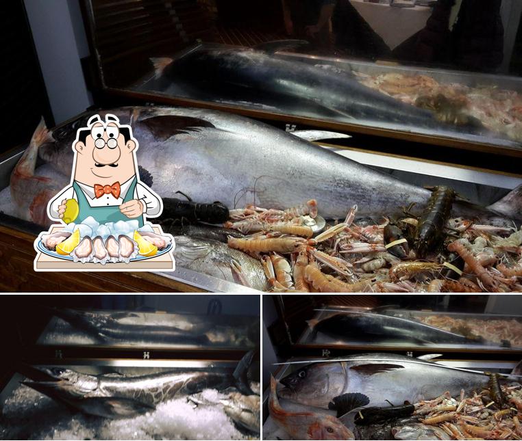Assaggia i sapori della cucina di mare a Ristorante L'approdo