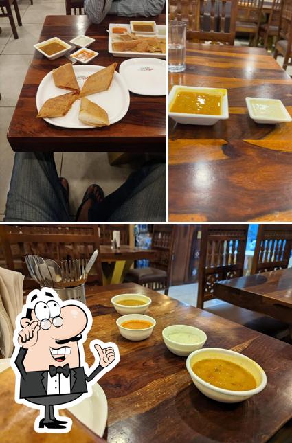 The interior of Dosa Plaza Udaipur - Best Pure Veg Family Restaurant & Hotel
