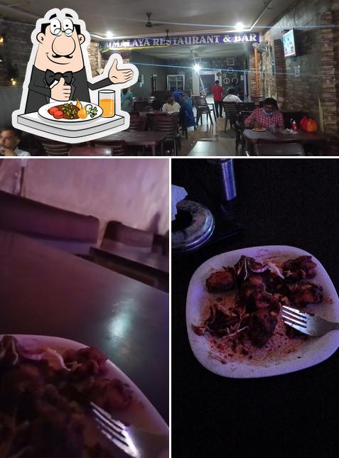 Take a look at the photo showing food and interior at SIRI Bar & Restaurant