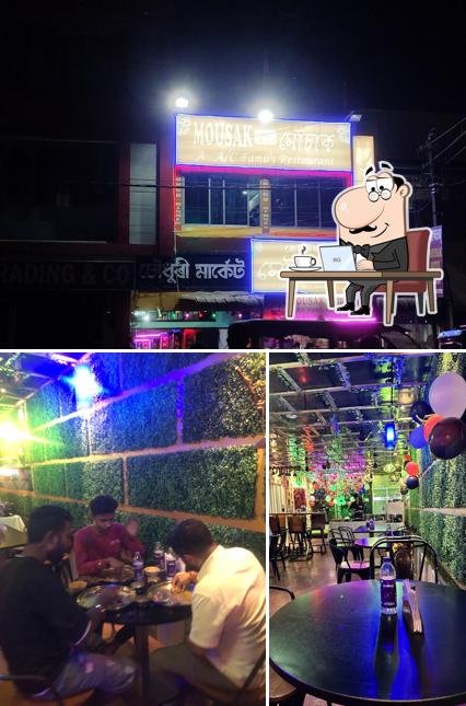 Take a look at the image displaying interior and exterior at Mousak a ac family restaurant