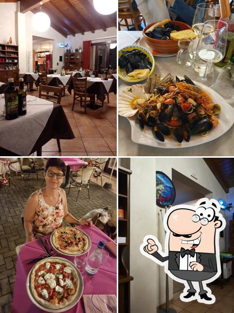 Dai un'occhiata agli interni di Ristorante Pizzeria Vesuvio Di Castellano Elisa