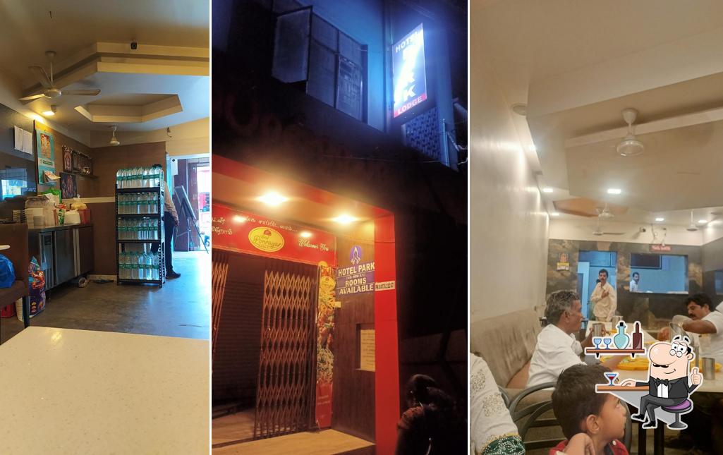 Take a seat at one of the tables at Hotel Ponrayar (Kosamadam Branch)