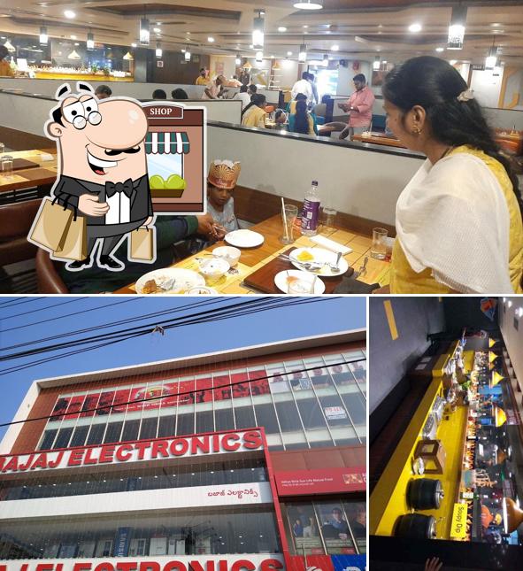 The picture of AB's - Absolute Barbecues Vizag, Andhra Pradesh’s exterior and dining table