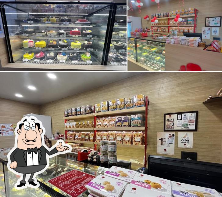 The image of Atul Bakery Shivalik Park Shela’s interior and food