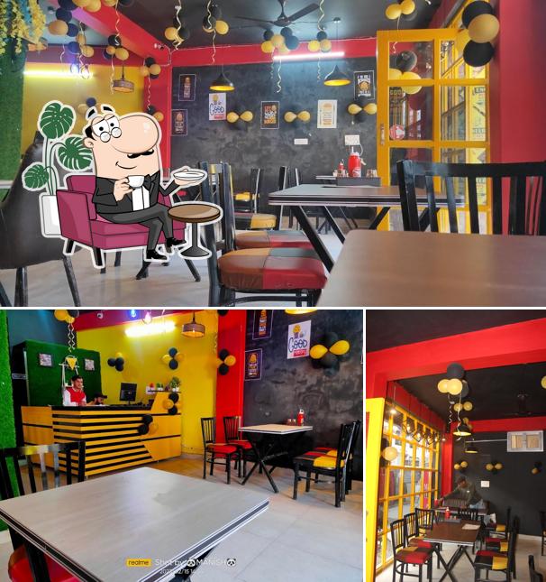 Take a seat at one of the tables at Engineer Pizza Cafe