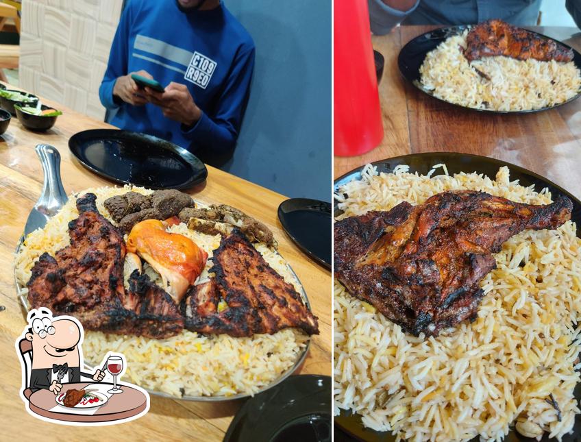 Get meat dishes at Al BADAR Kuzhimanthi