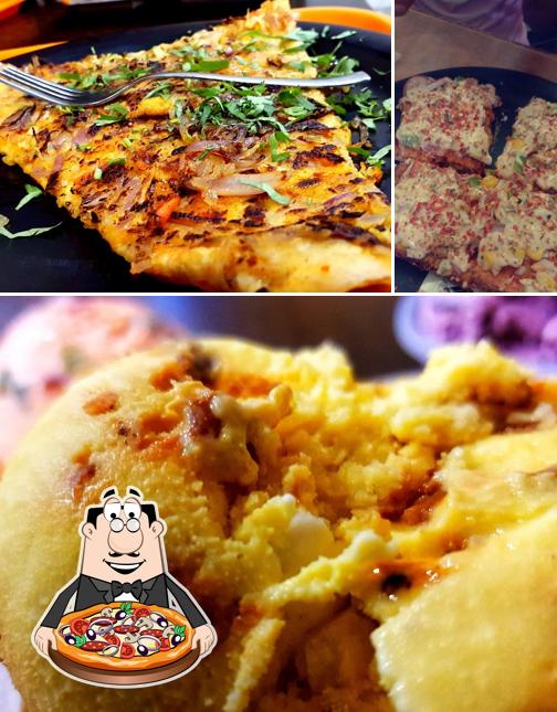 Get pizza at Maggi House