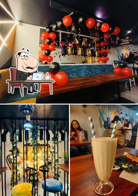 Check out the image depicting interior and food at The Cafe DAmour
