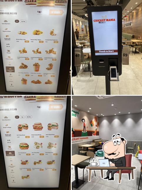 Take a seat at one of the tables at Burger King Take a seat at one of the tables at Burger King