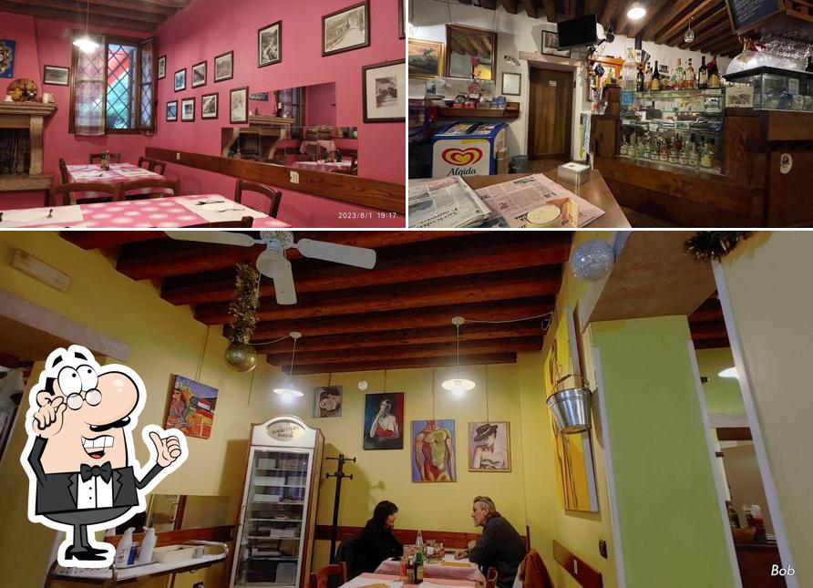 Siediti a un tavolo di Ristorante Pizzeria al Mondo